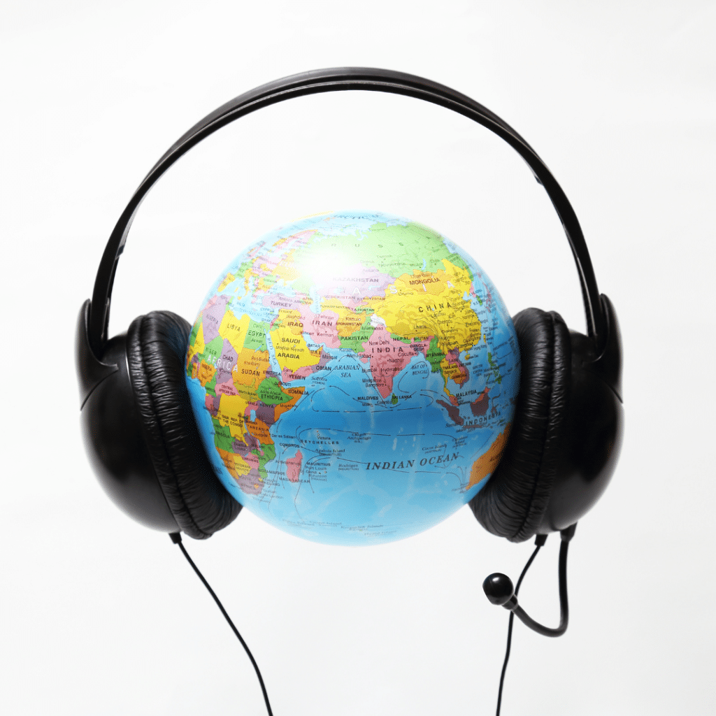 Pair of headphones on a globe